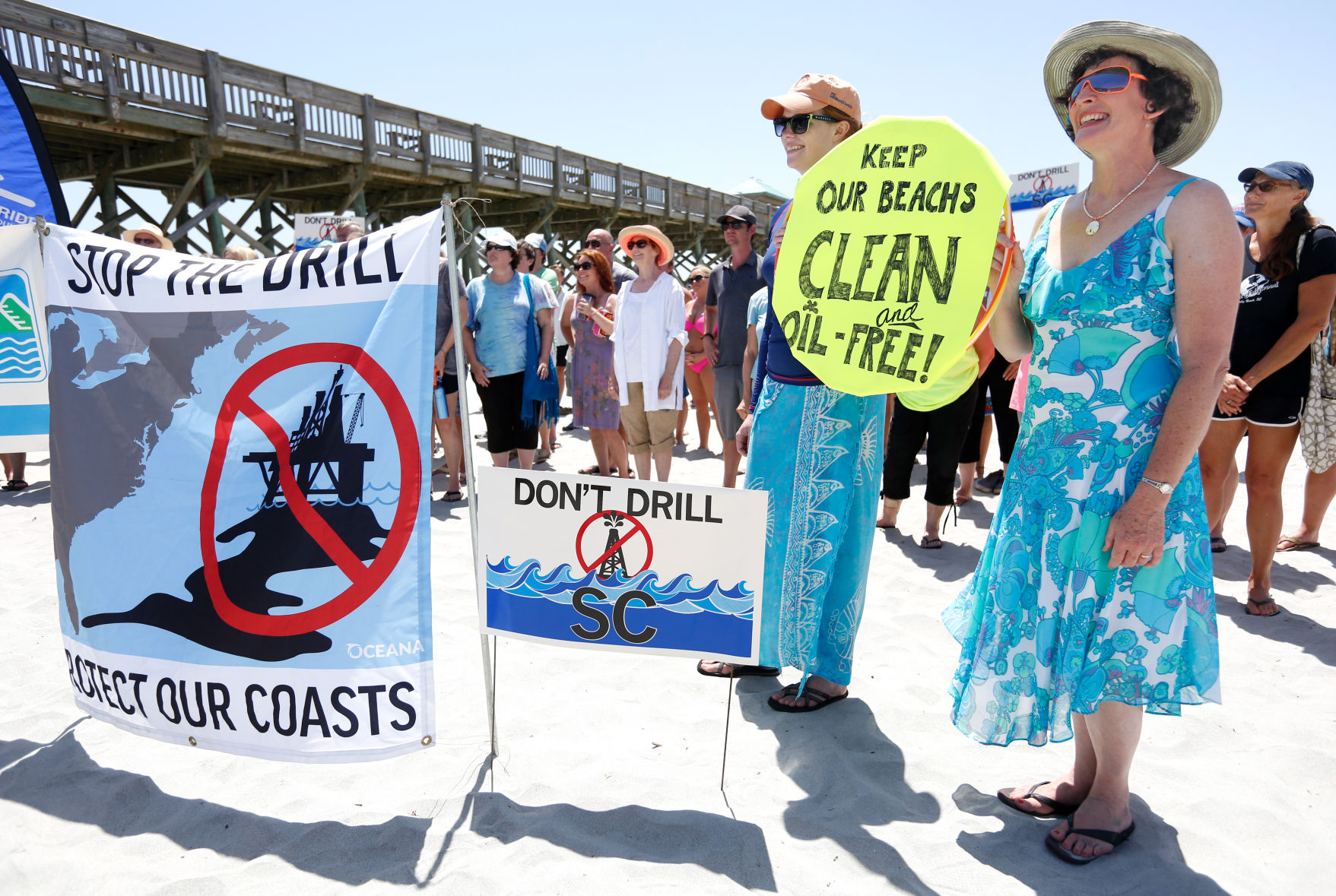 holding signs wide.jpg (copy) (copy)